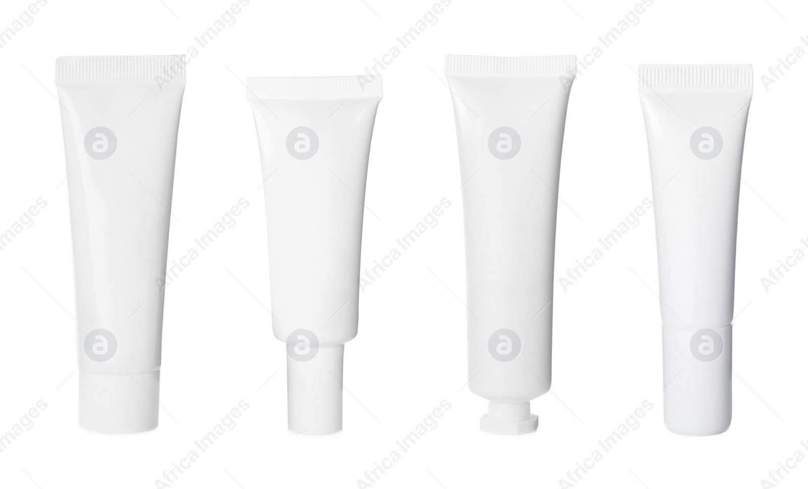 Image of Set with blank tubes of cosmetic products on white background. Mockup for design