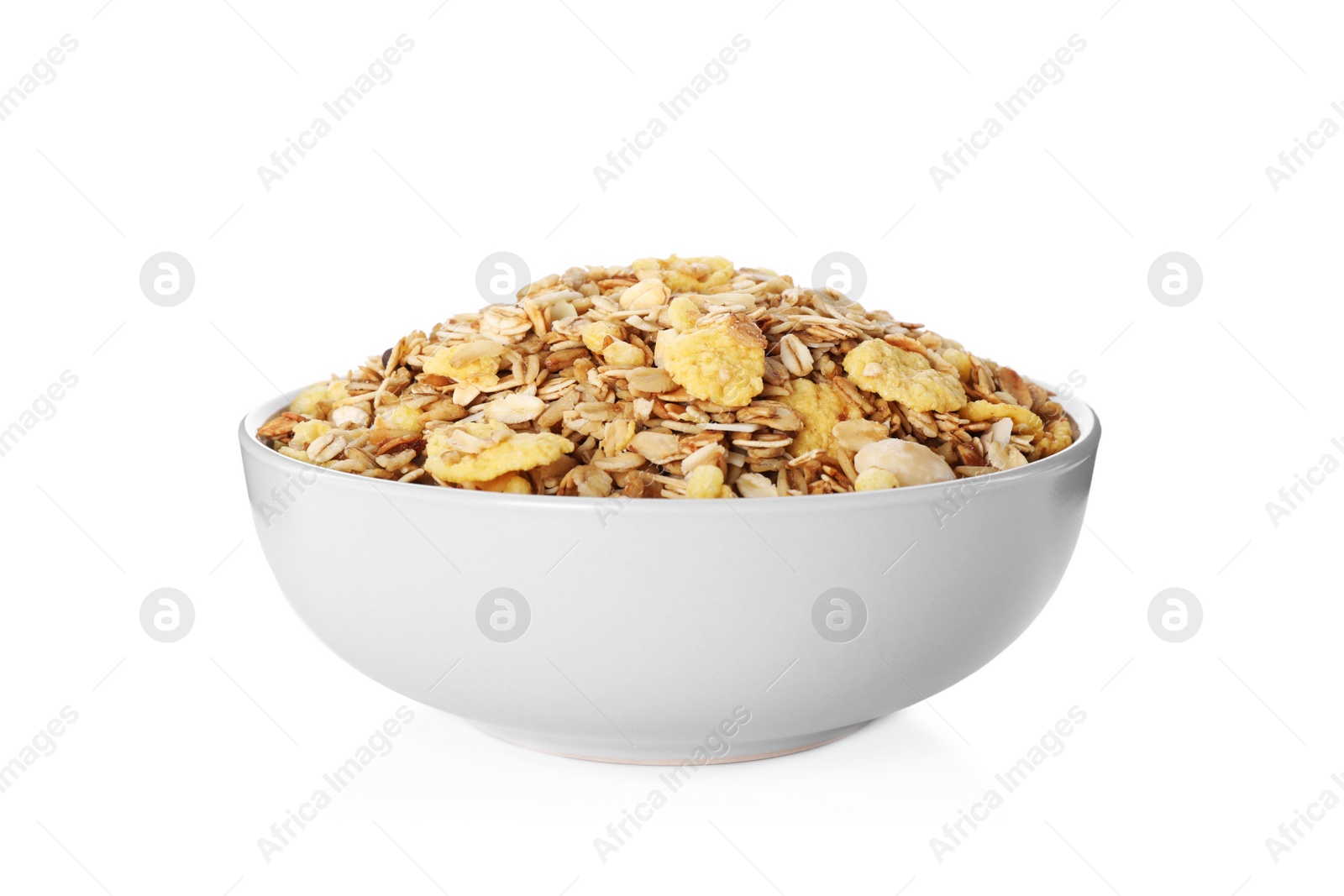 Photo of Bowl with fresh muesli on white background