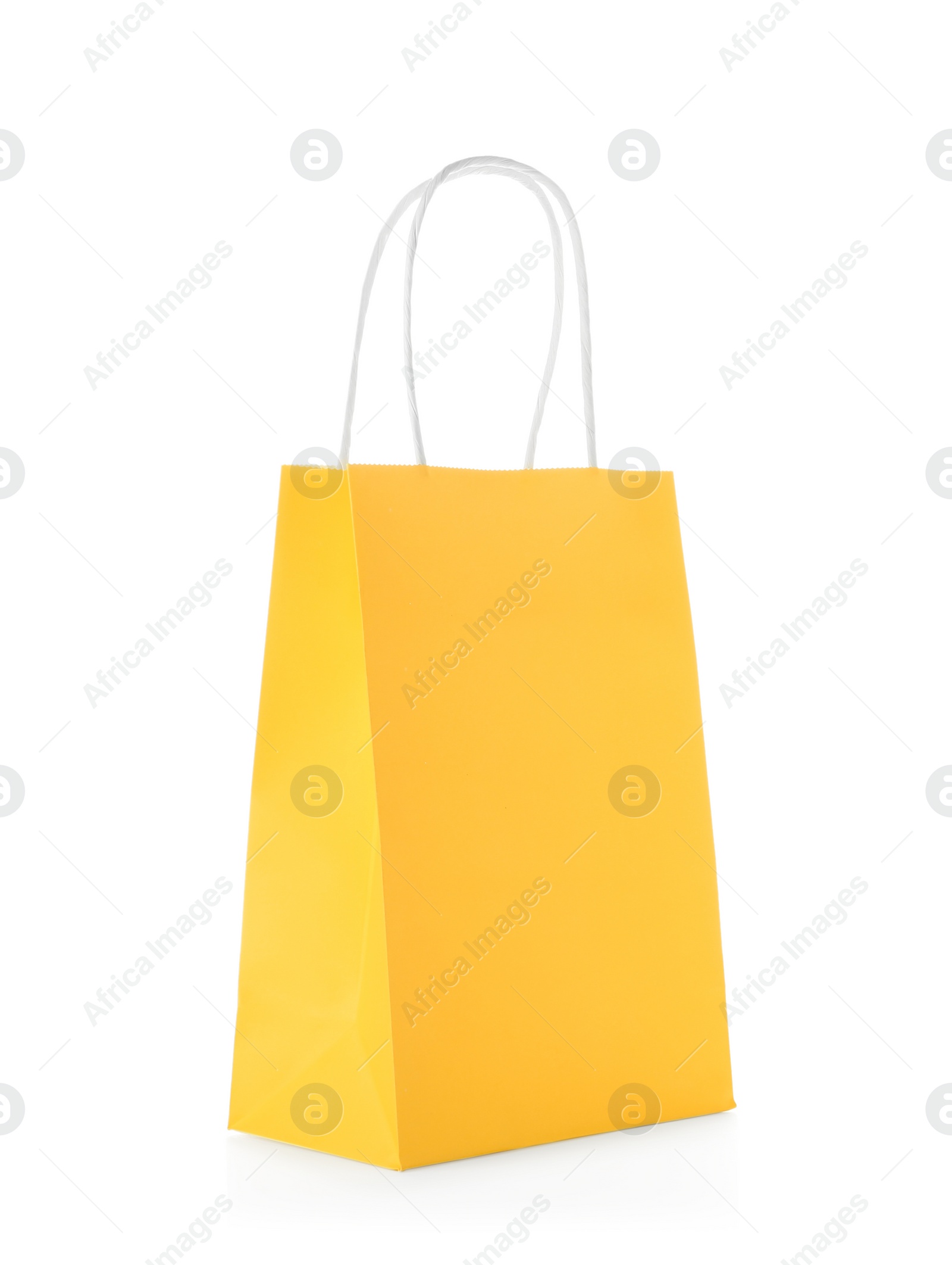 Photo of Mockup of paper shopping bag on white background