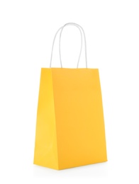 Photo of Mockup of paper shopping bag on white background