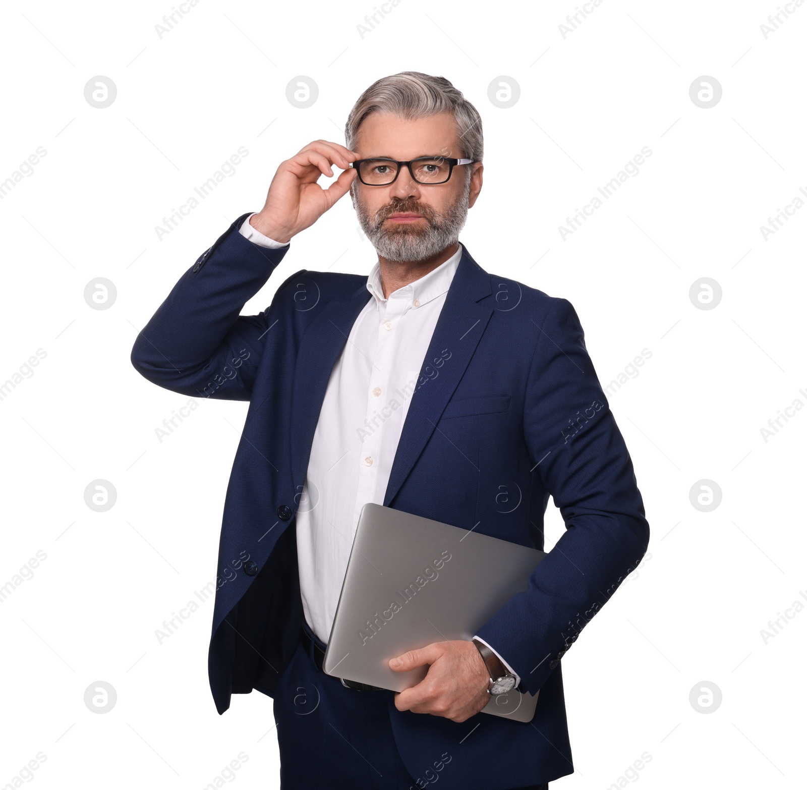 Photo of Portrait of serious man in glasses with laptop on white background. Lawyer, businessman, accountant or manager