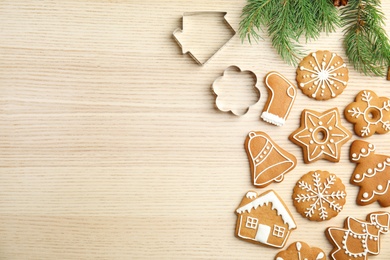 Photo of Tasty homemade Christmas cookies on wooden background, top view