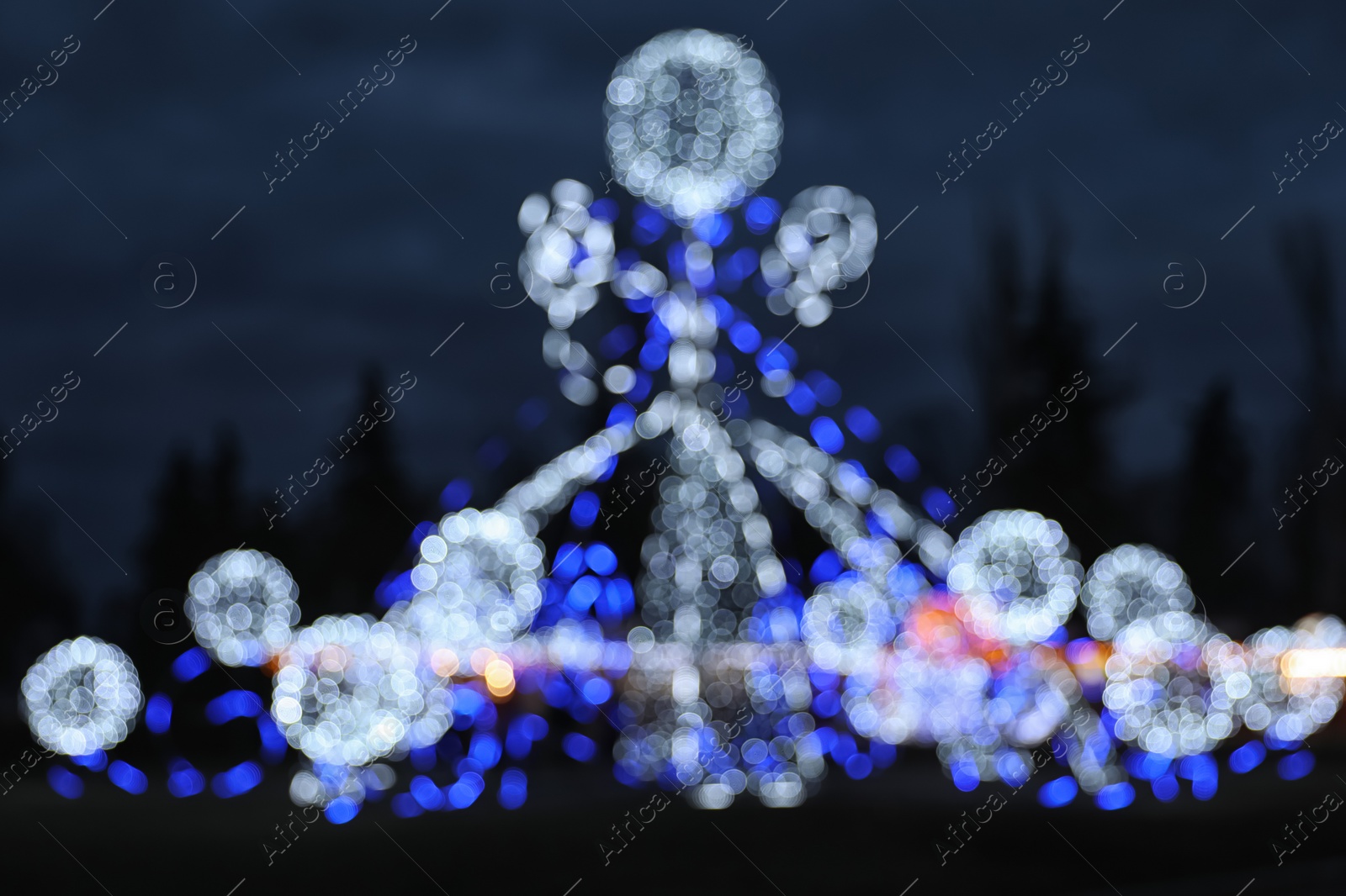 Photo of Beautiful bright Christmas decor outdoors. Bokeh effect