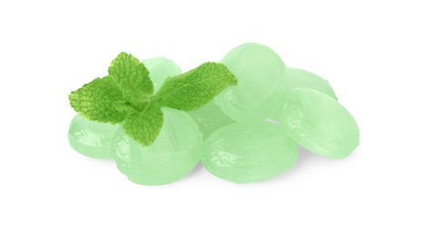 Many light green cough drops with mint on white background