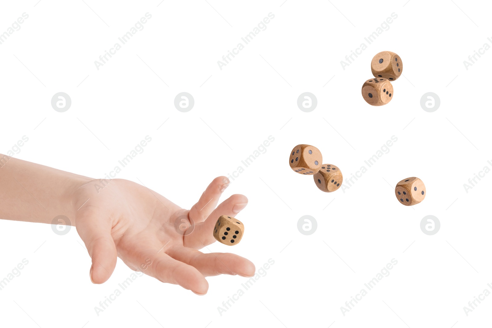 Image of Woman throwing wooden dice on white background, closeup