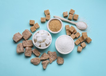 Photo of Different types of sugar on turquoise background, flat lay