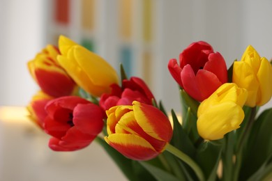 Easter celebration. Bouquet of beautiful tulips on blurred background, closeup