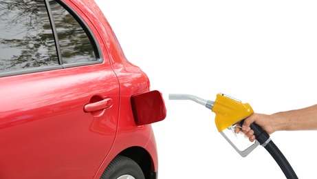 Image of Gas station worker with fuel nozzle near car on white background, closeup
