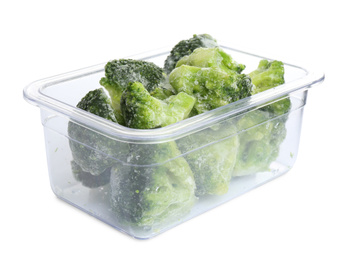 Frozen broccoli florets in plastic container isolated on white. Vegetable preservation