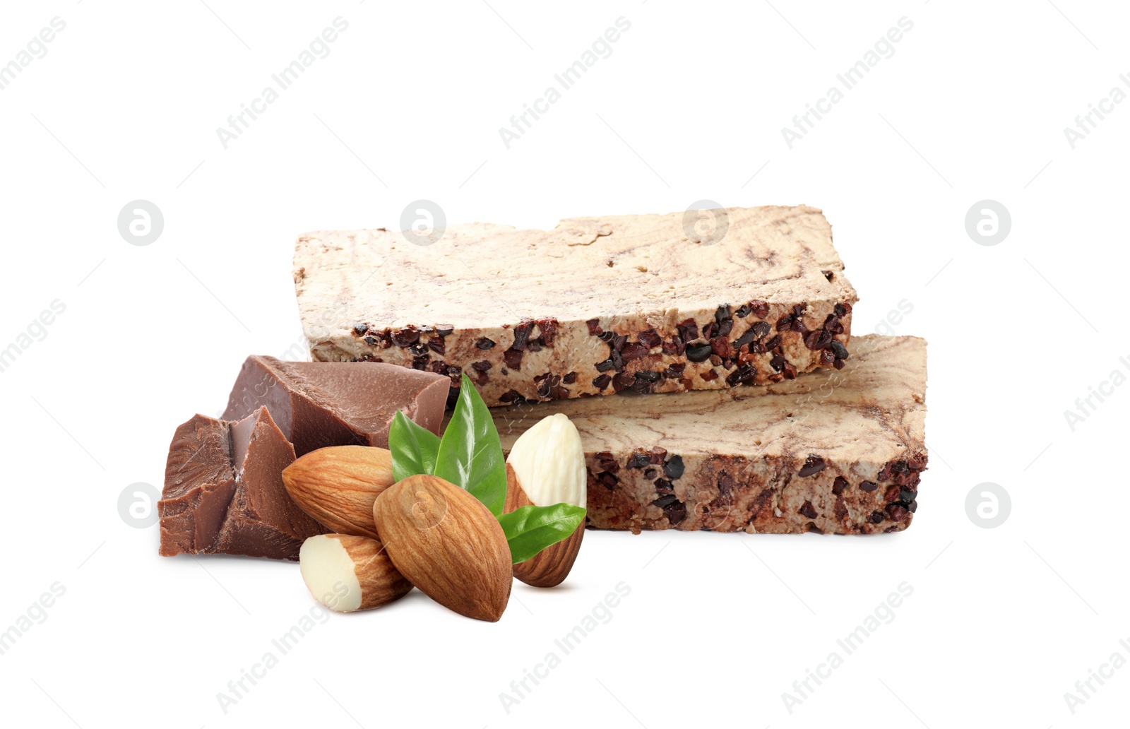 Image of Tasty halva, almonds, pieces of chocolate and green leaves isolated on white