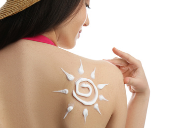 Young woman with sun protection cream on her back against white background, closeup