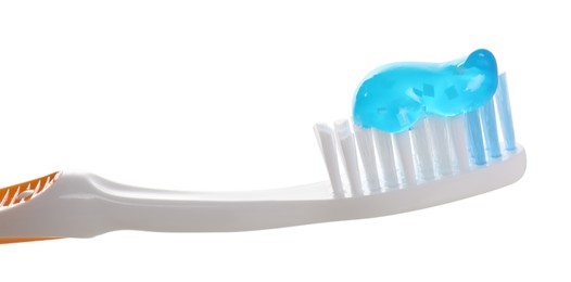 Plastic brush with toothpaste isolated on white