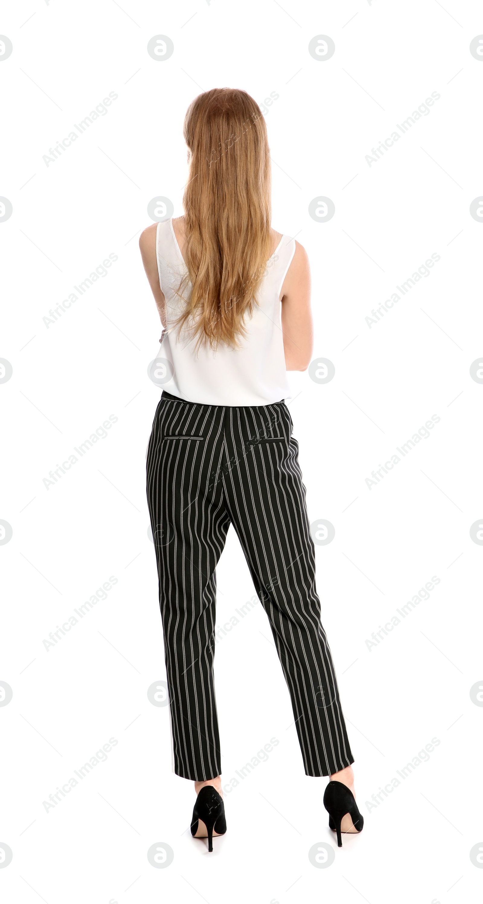 Photo of Young long haired woman posing on white background