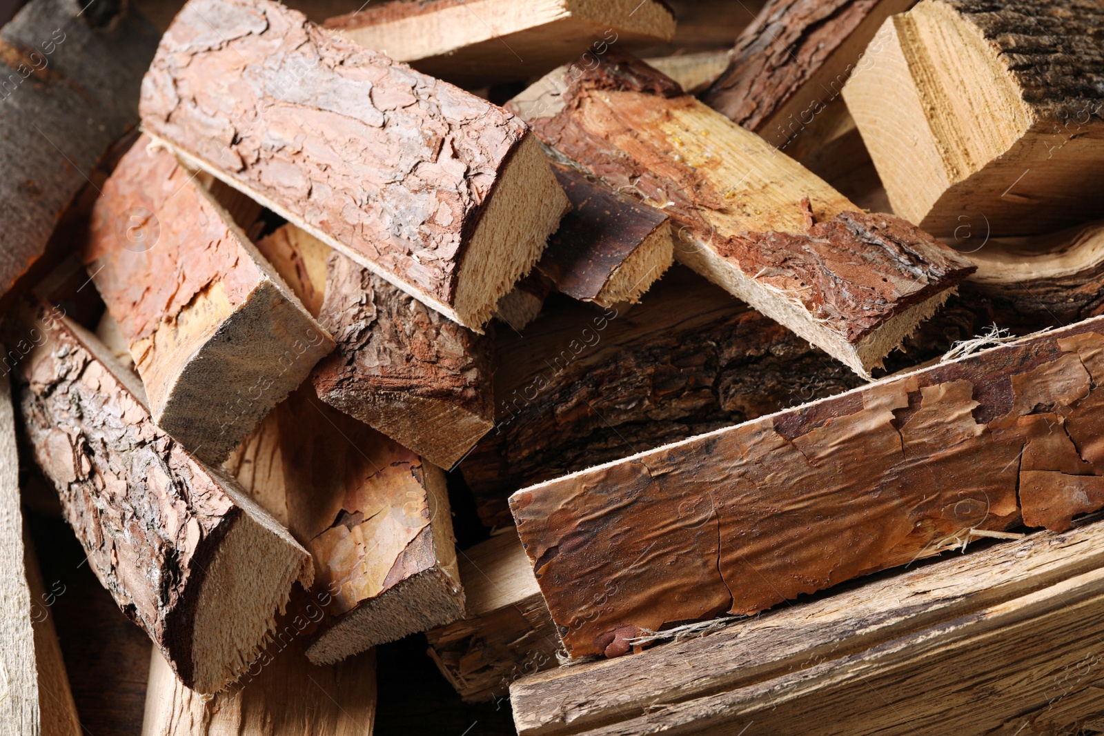 Photo of Cut firewood as background, closeup. Heating in winter