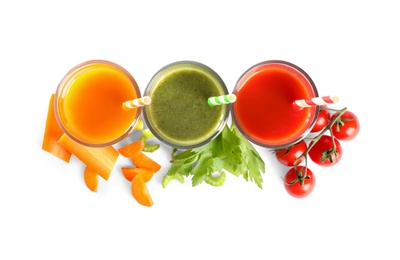 Delicious vegetable juices and fresh ingredients on white background, top view