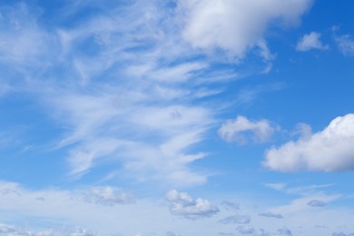 Photo of Picturesque blue sky with white clouds on sunny day