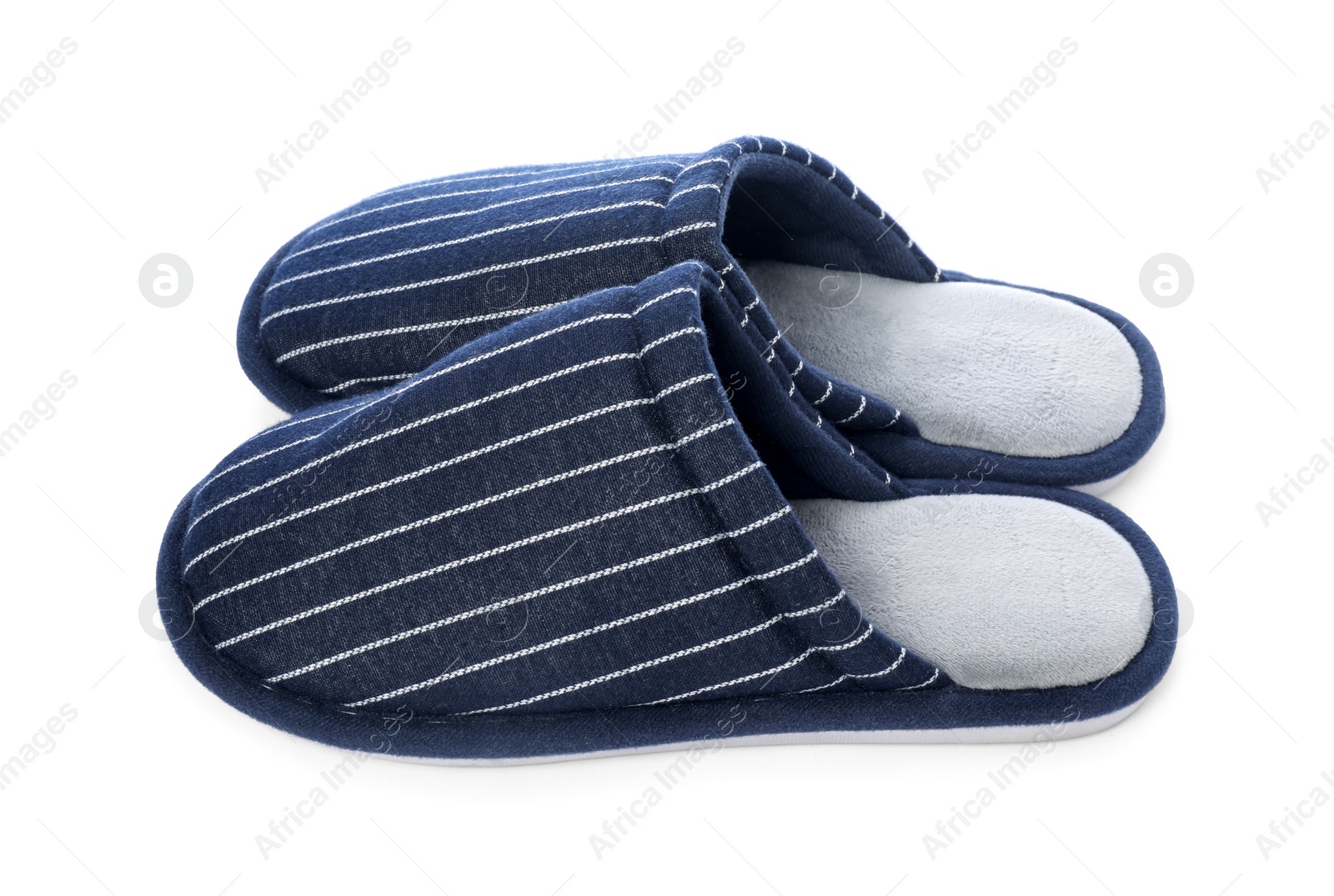 Photo of Pair of striped slippers isolated on white