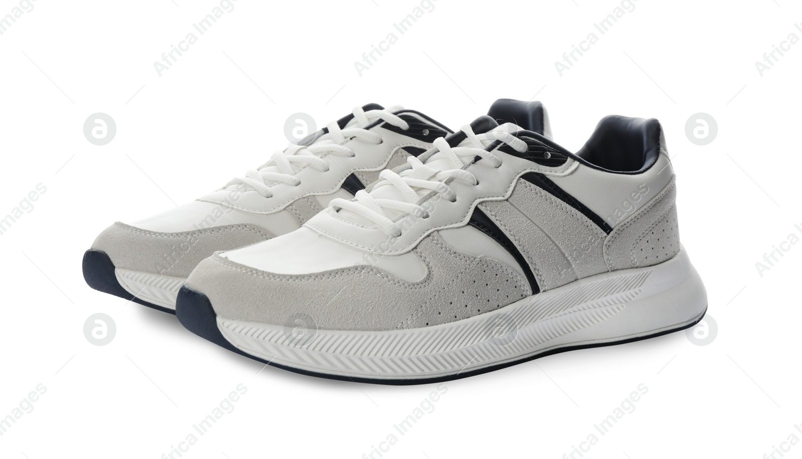 Photo of Pair of stylish sneakers on white background