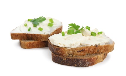Photo of Bread with cream cheese, green onion and parsley on white background
