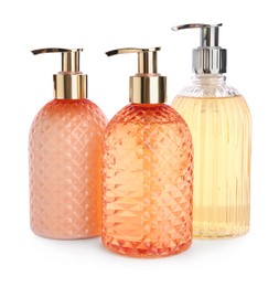 Photo of Stylish dispensers with liquid soap on white background