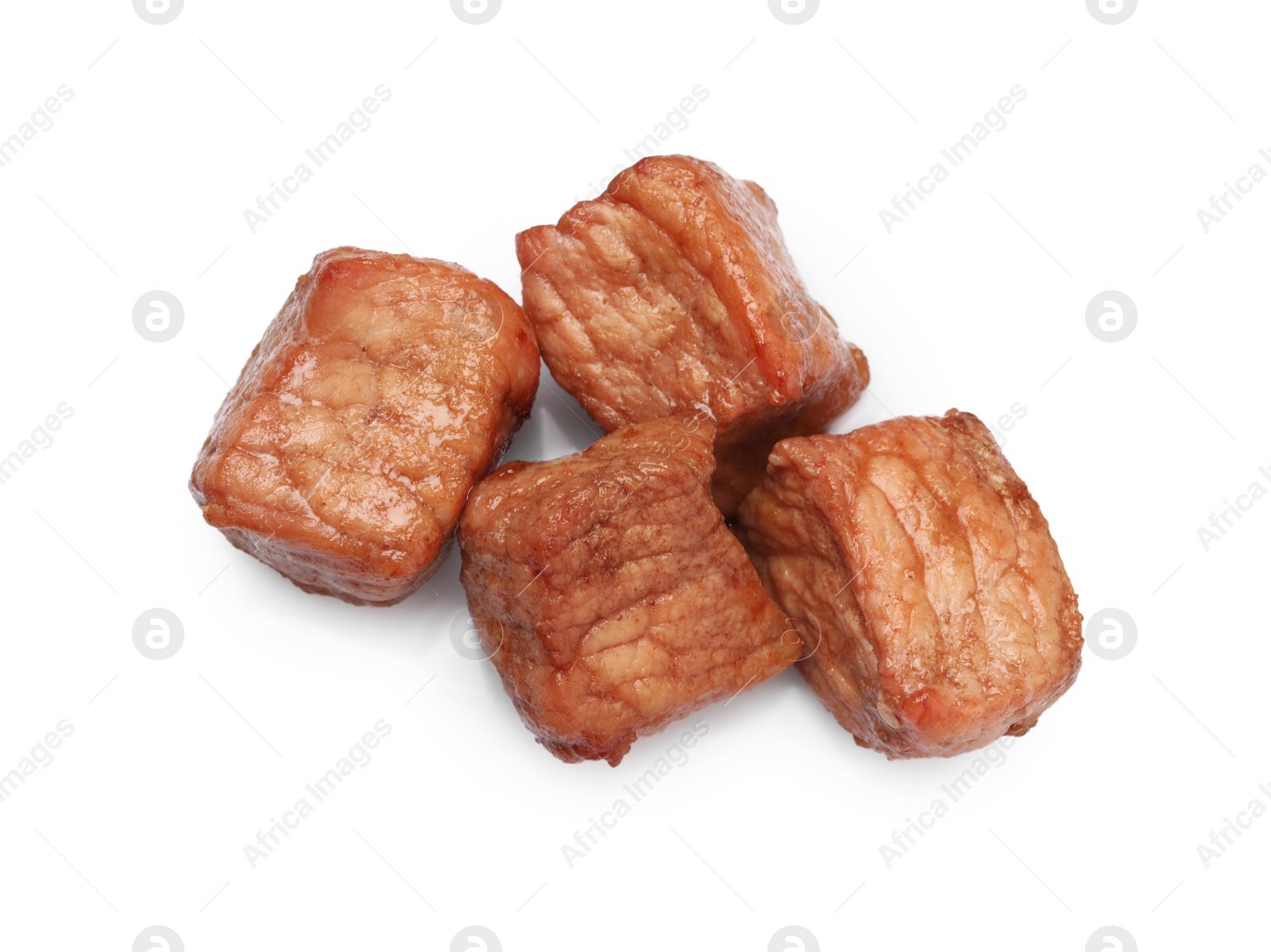 Photo of Pieces of delicious cooked beef isolated on white, top view. Tasty goulash