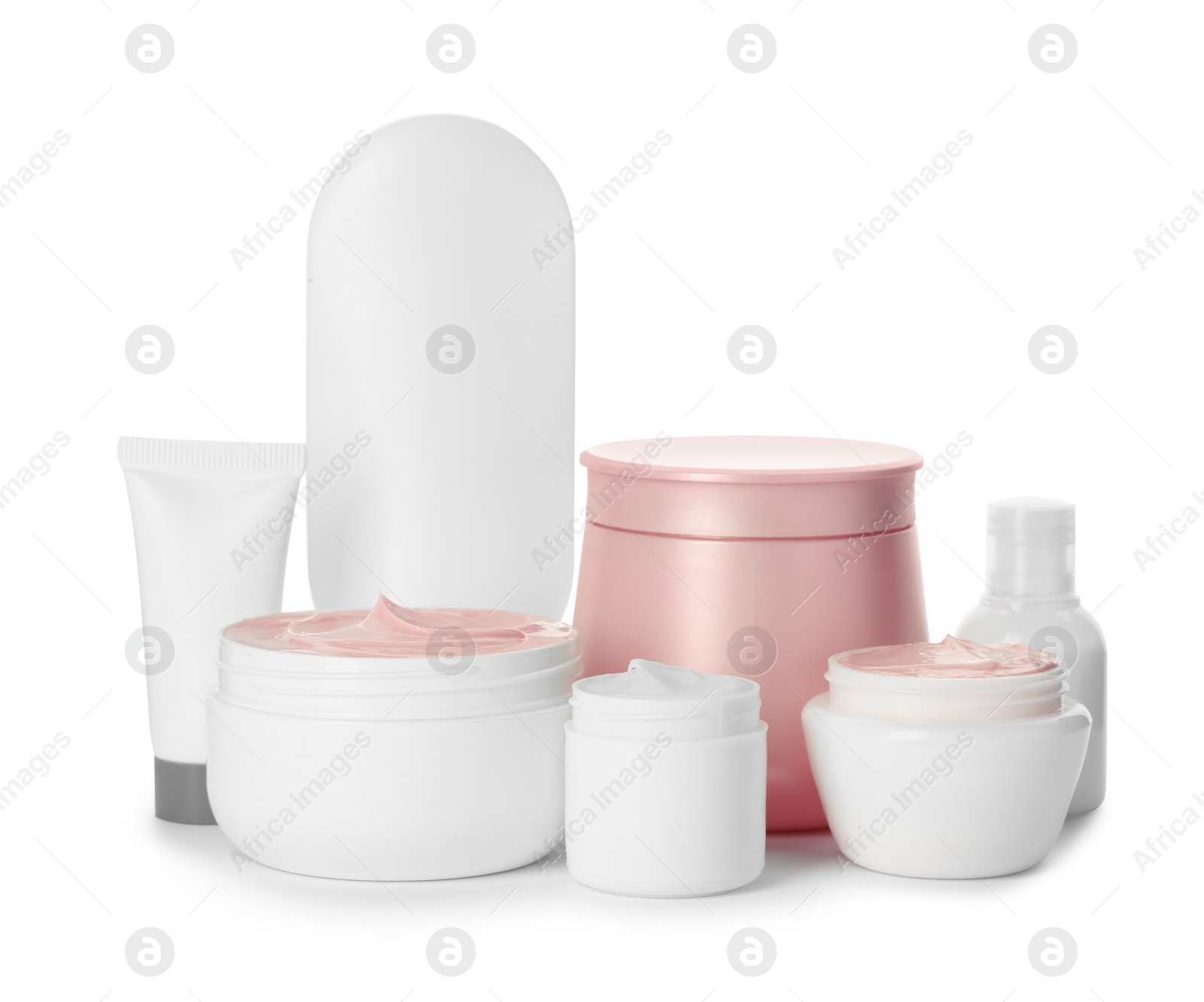 Photo of Different containers with hand cream and other cosmetic on white background