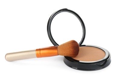 Photo of Face powder with brush on white background. Makeup product