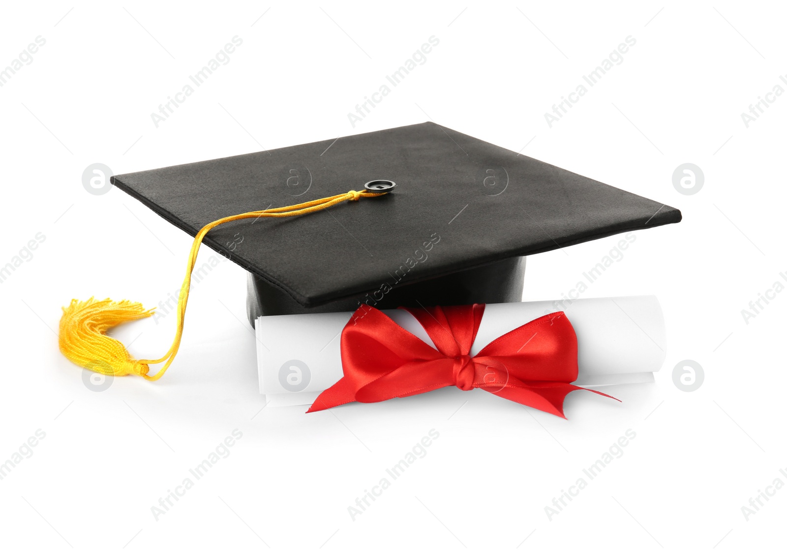 Photo of Graduation hat and diploma on white background