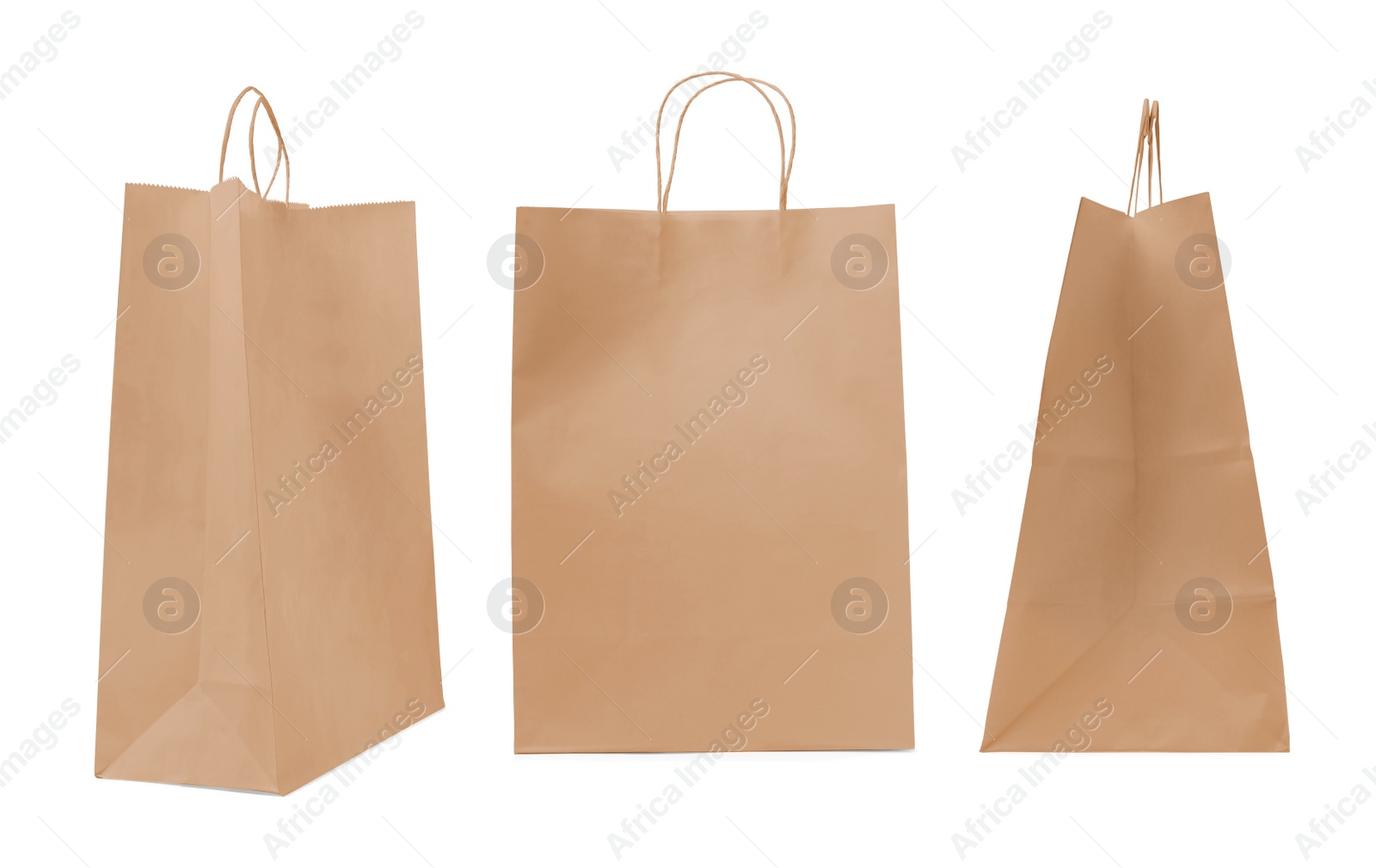 Image of Set with kraft paper bags on white background