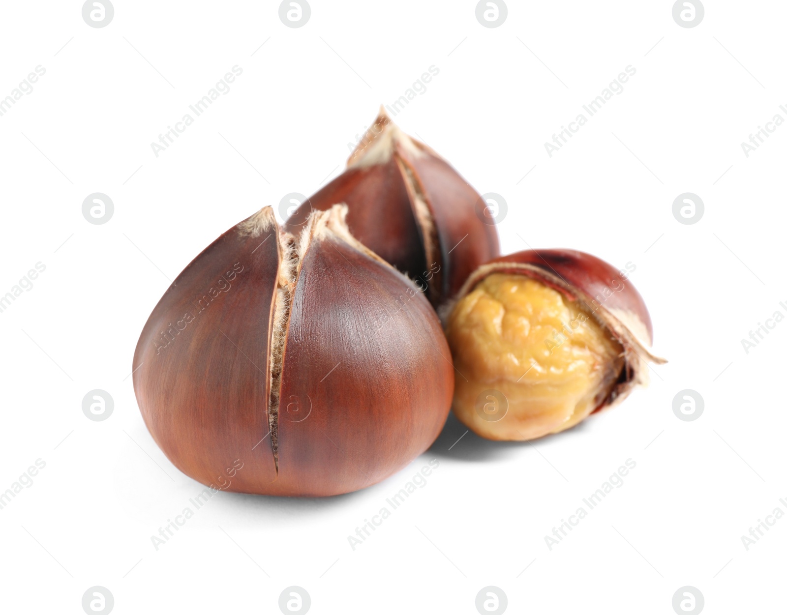 Photo of Delicious sweet roasted edible chestnuts isolated on white