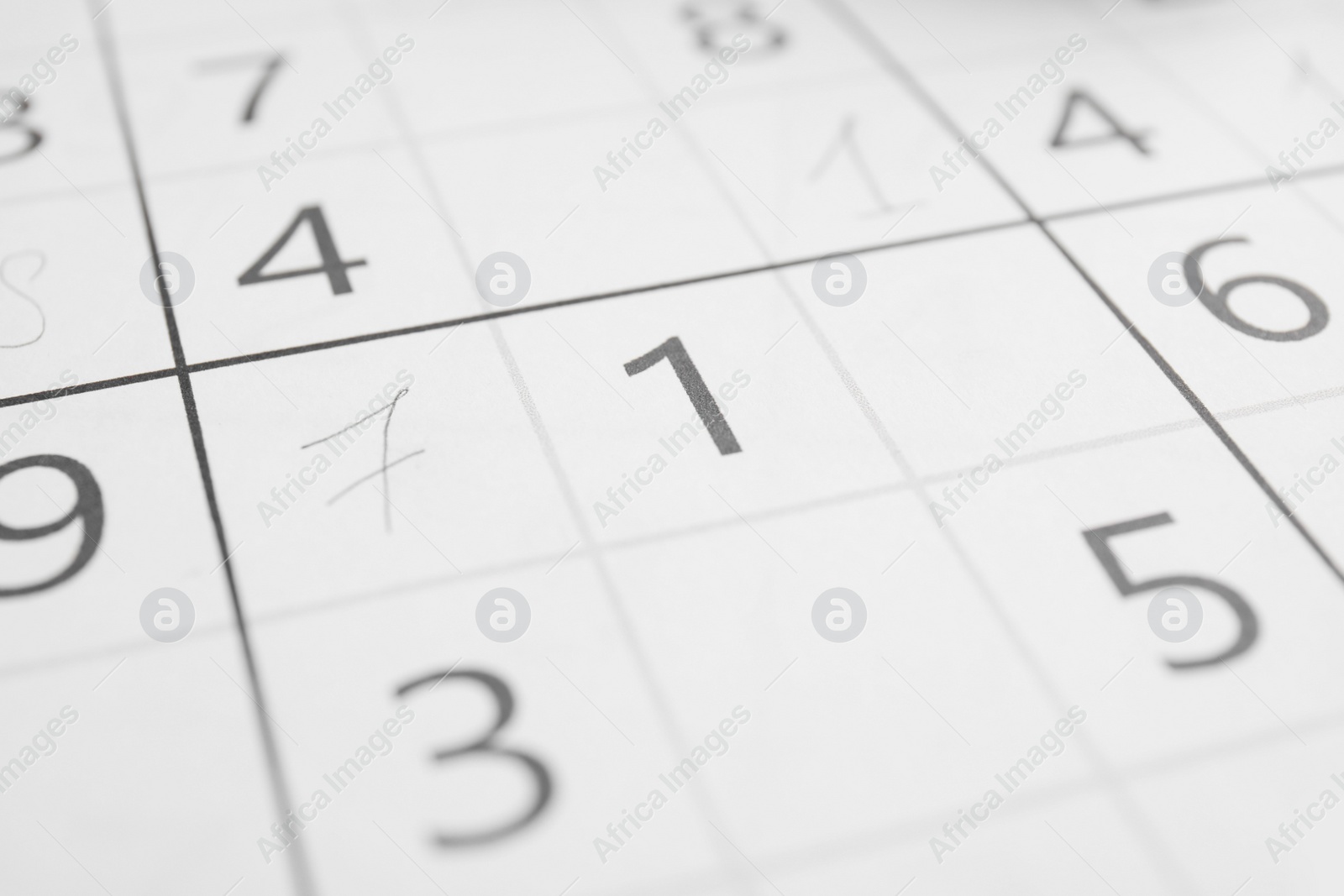 Photo of Sudoku puzzle grid as background, closeup view