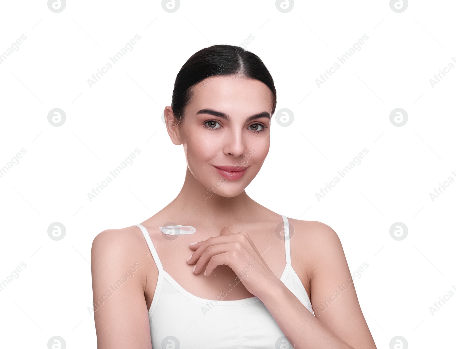Photo of Beautiful woman with smear of body cream on her collarbone against white background