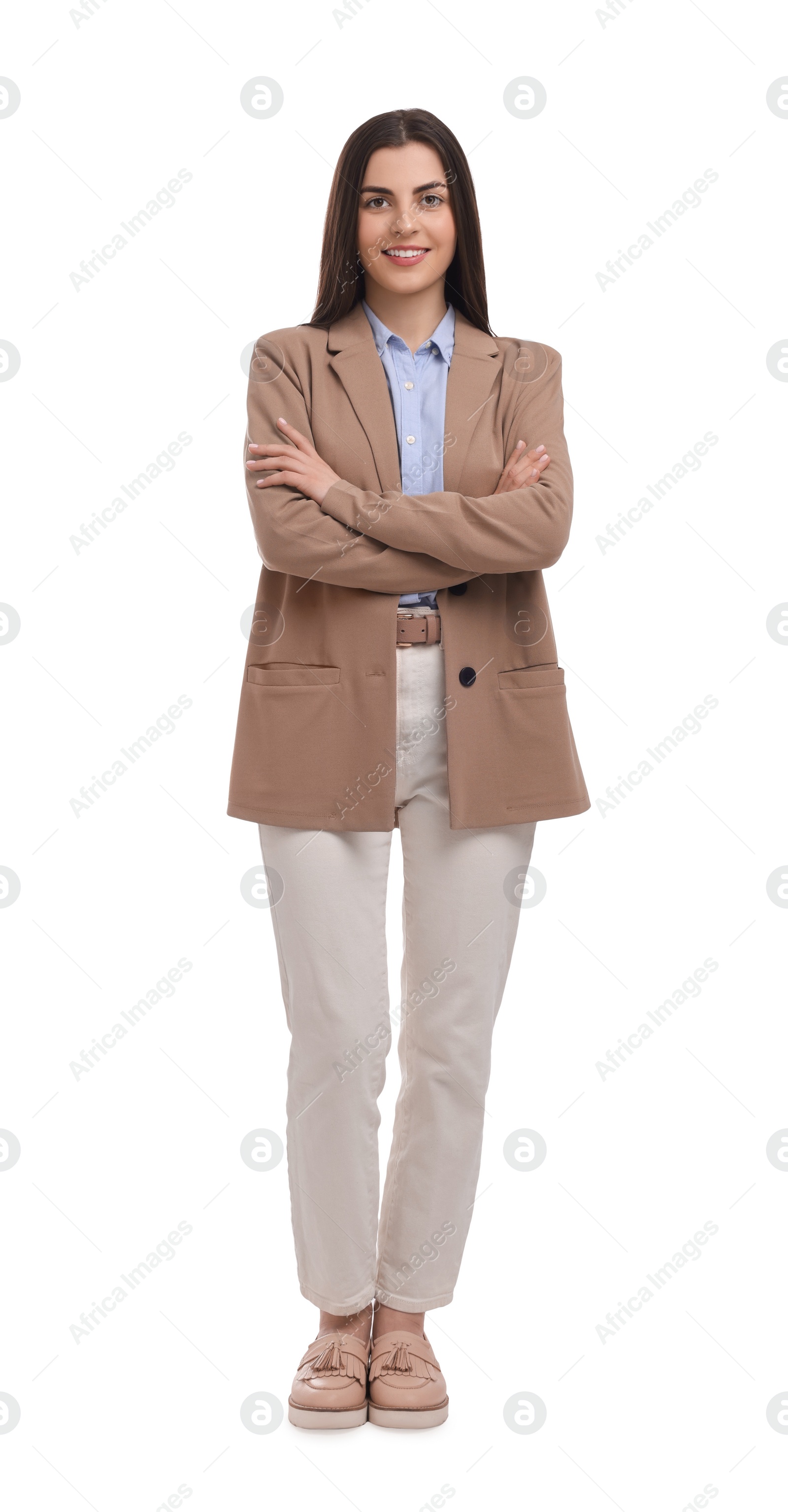 Photo of Beautiful happy businesswoman crossing arms on white background