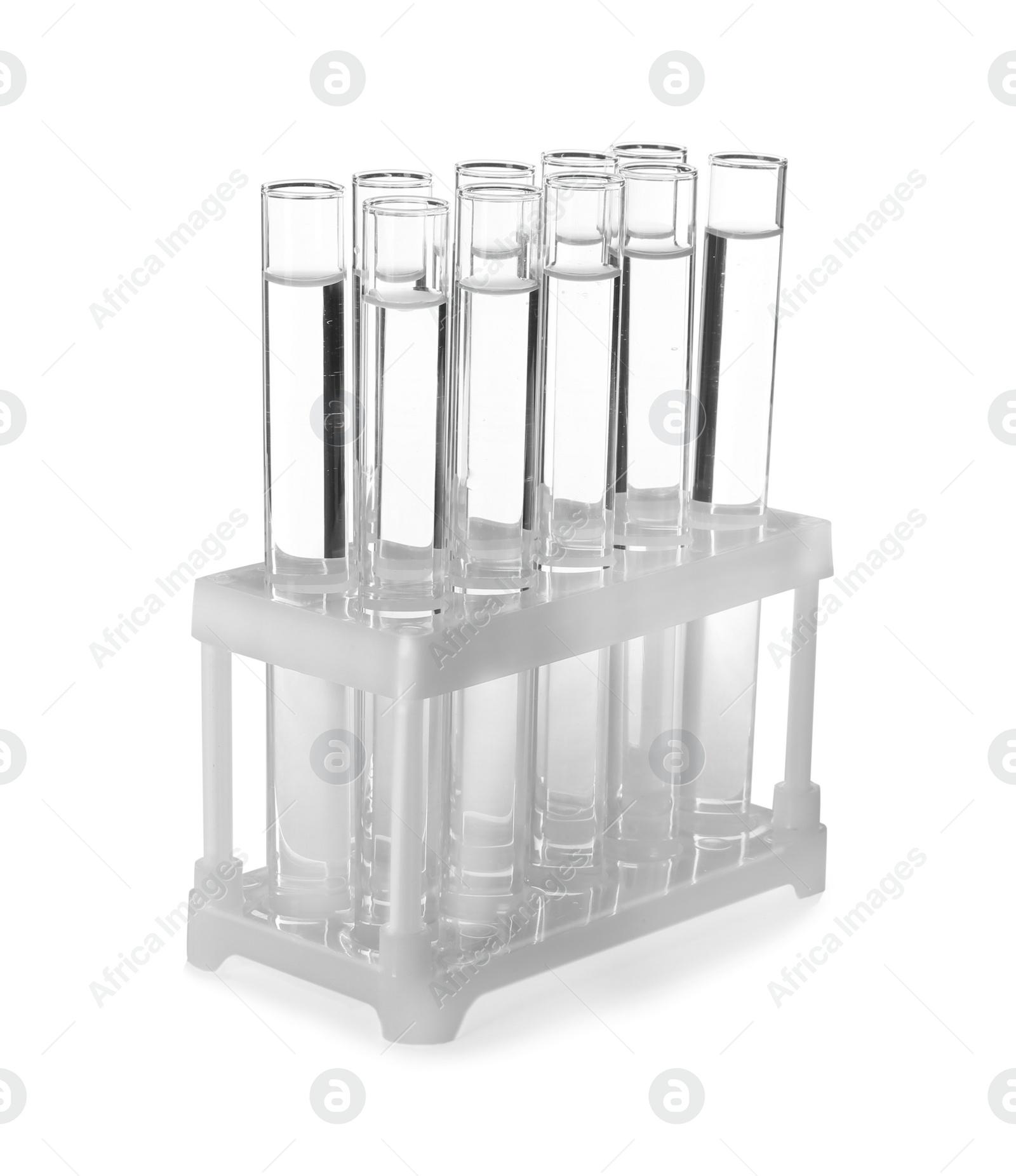 Photo of Test tubes with liquid on white background. Laboratory analysis equipment