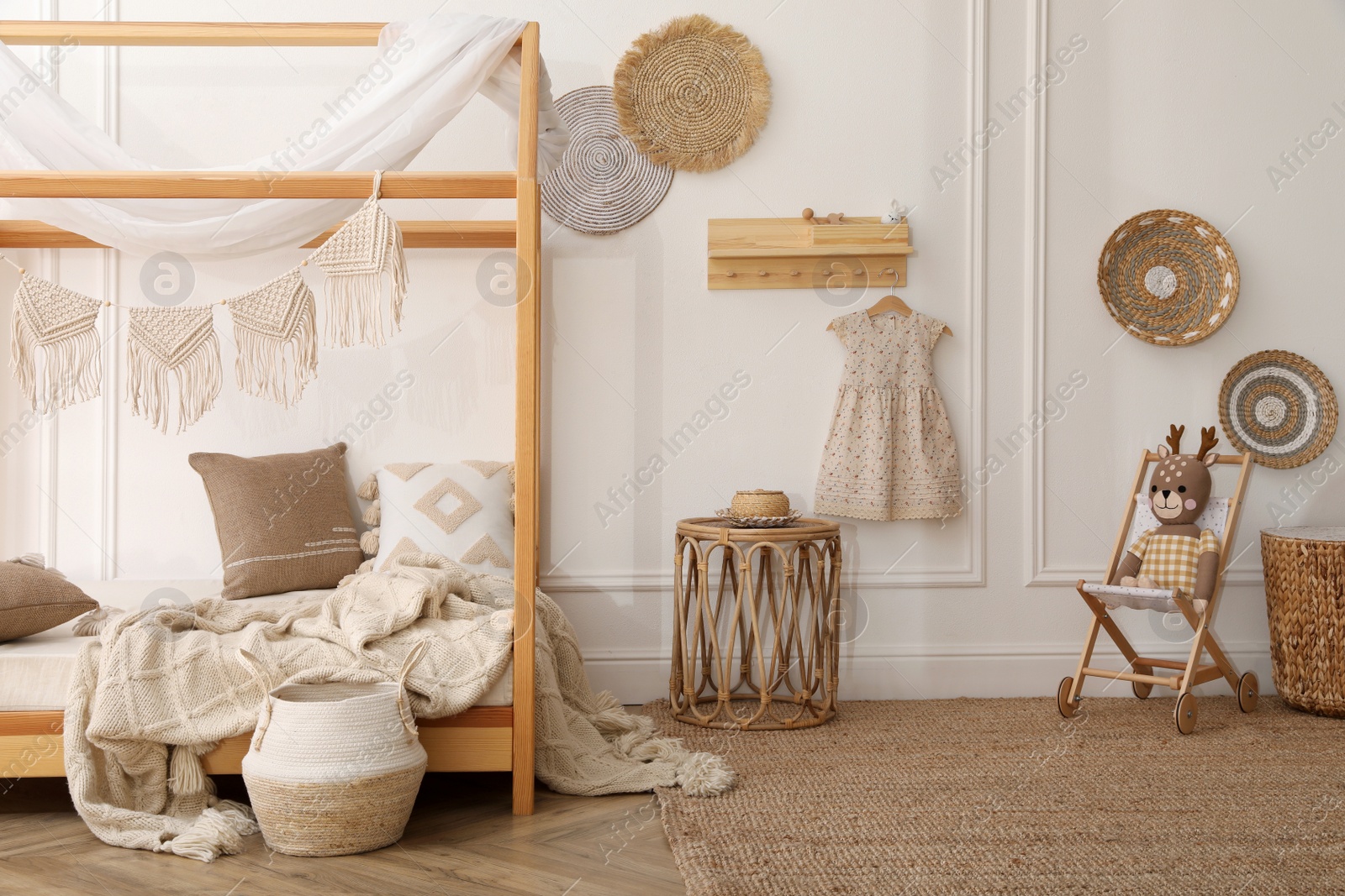 Photo of Stylish child room interior with house bed