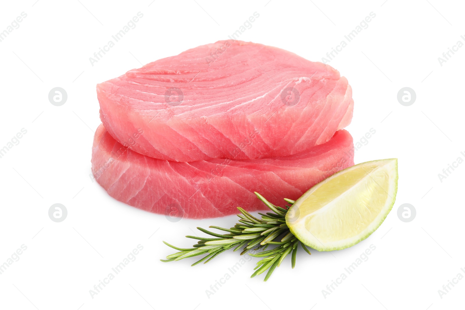 Photo of Raw tuna fillets with lime wedge and rosemary on white background