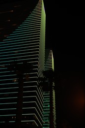 BATUMI, GEORGIA - JUNE 09, 2022: View of night cityscape with illuminated buildings
