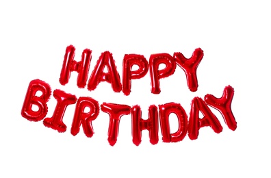 Photo of Phrase HAPPY BIRTHDAY made of color balloon letters on white background