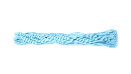 Photo of Light blue embroidery thread on white background