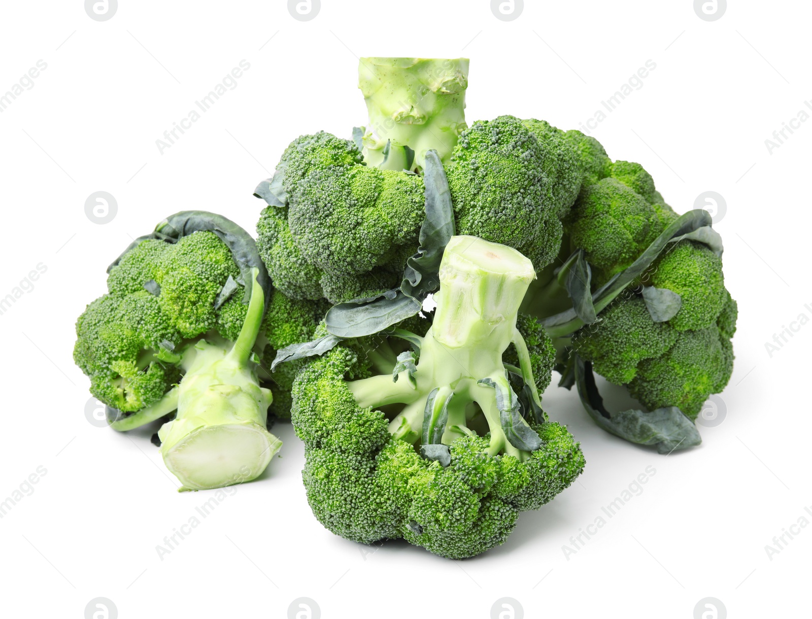 Photo of Pile of fresh raw green broccoli isolated on white