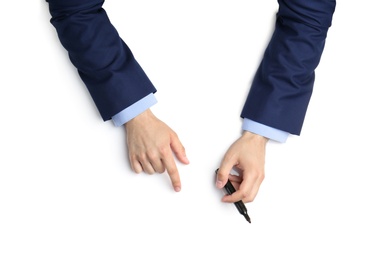 Man with marker on white background, top view. Closeup of hands