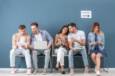 Group of people waiting for job interview, indoors