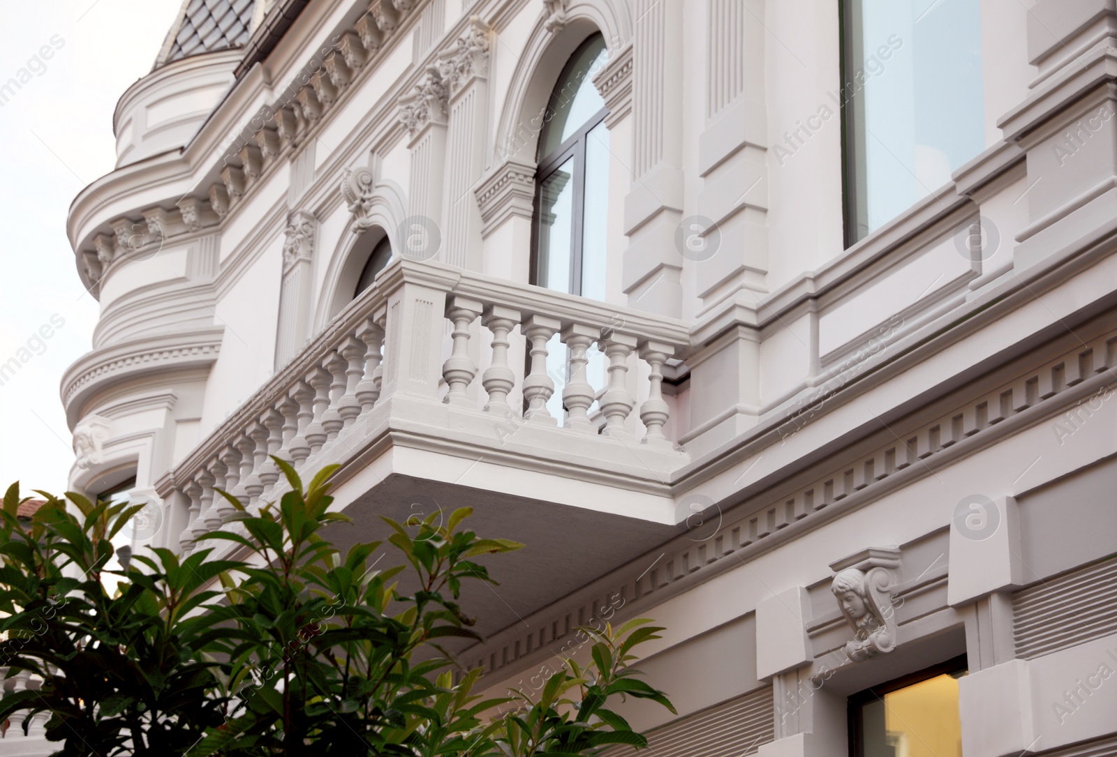 Photo of Exterior of beautiful building with balcony outdoors