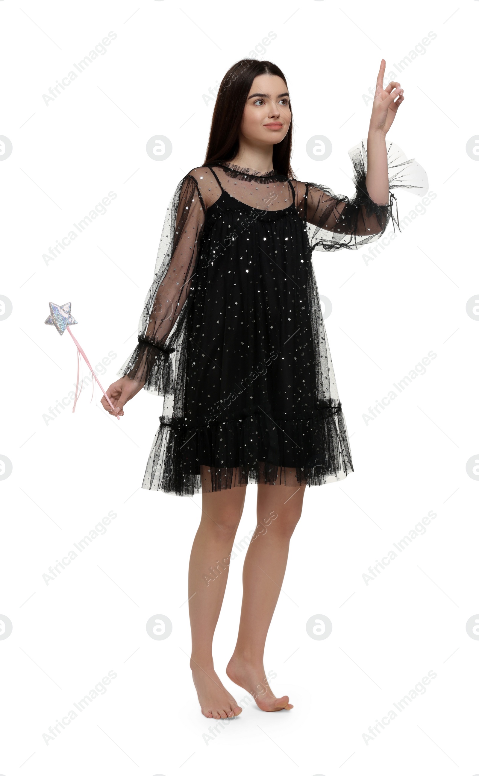 Photo of Beautiful girl in fairy dress with magic wand on white background