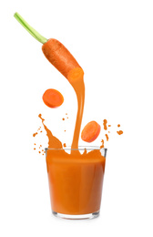 Fresh cut carrot and glass of juice with splashes on white background