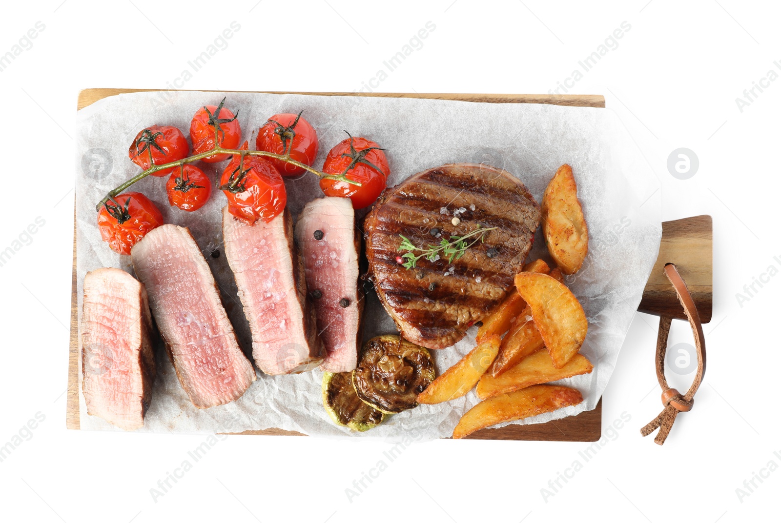 Photo of Delicious beef served with garnish isolated on white, top view