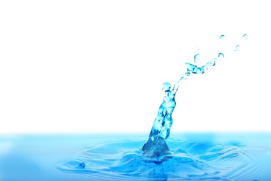 Splash of blue water with drops on white background, closeup