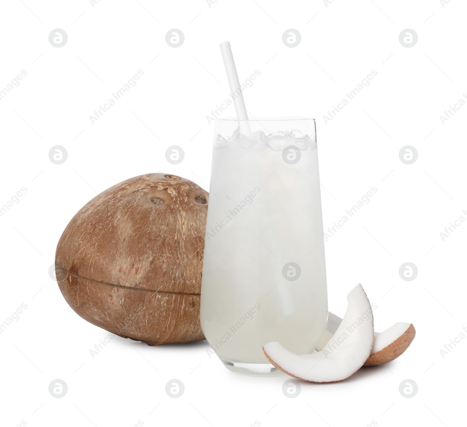 Photo of Glass of coconut water, ice cubes and nuts isolated on white