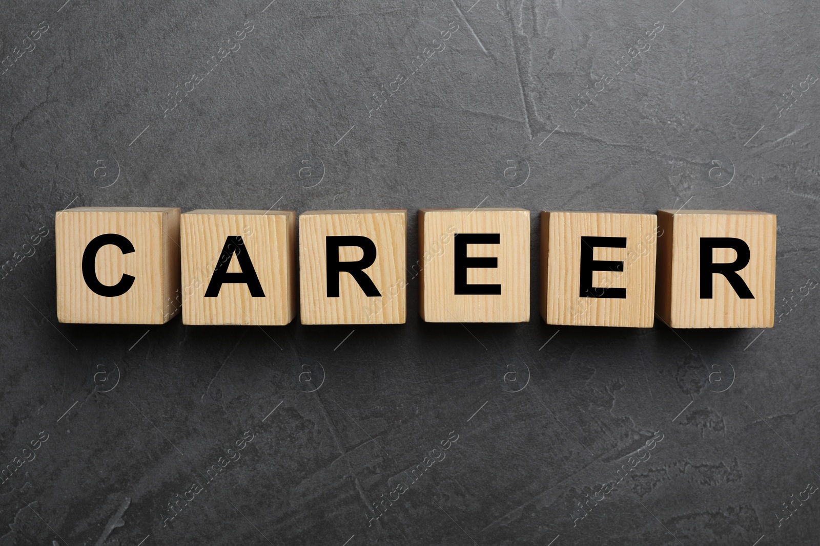 Photo of Cubes with word CAREER on grey background, flat lay