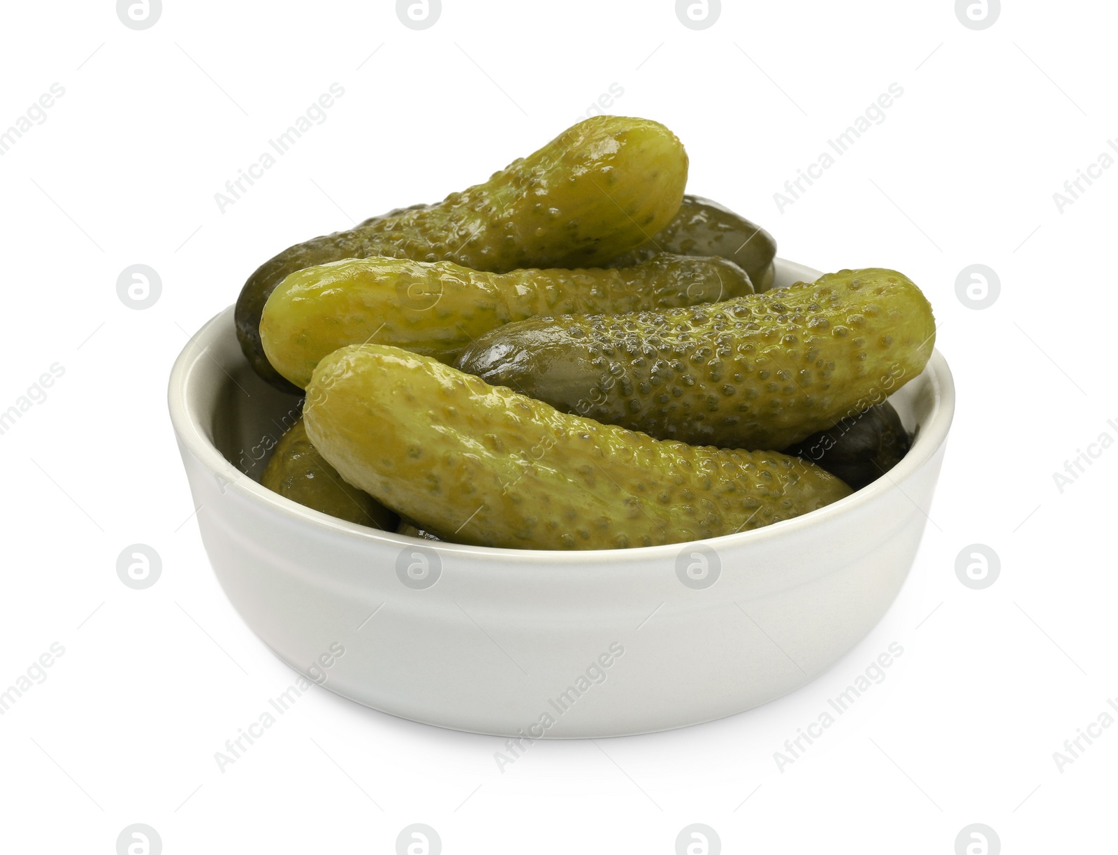 Photo of Tasty pickled cucumbers in bowl isolated on white
